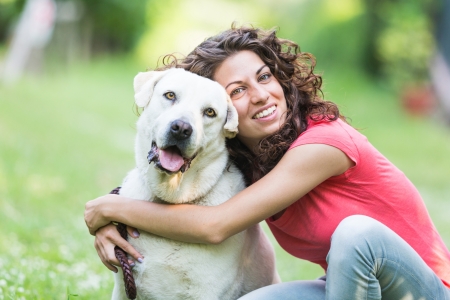 Labrador Retriever and their owner